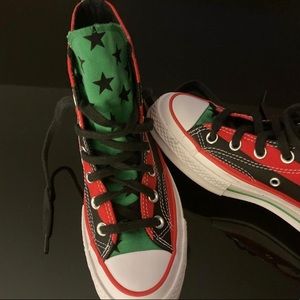 Converse/Denim Tears collab Pan African high top sneakers.